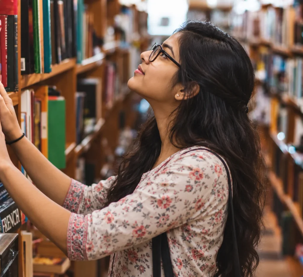 A Thoughtful Moment Among Books